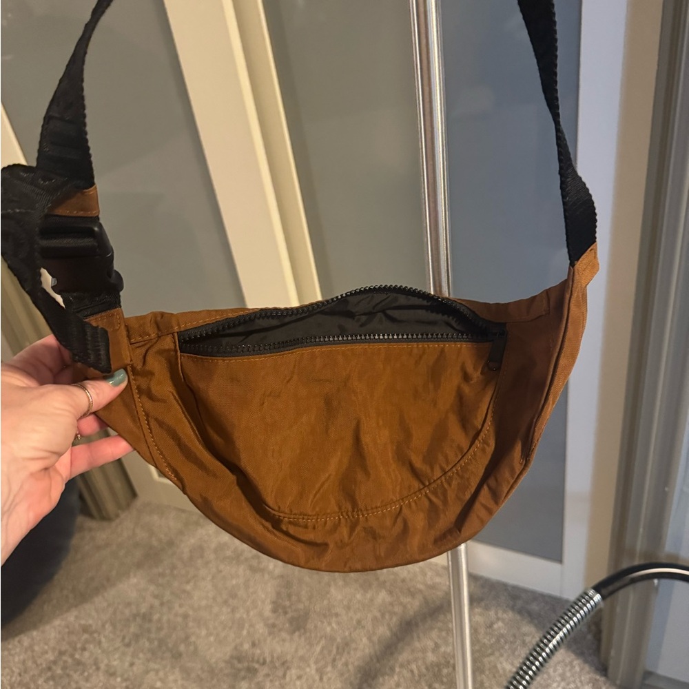 BAGGU Crescent Fanny Pack in a brown color